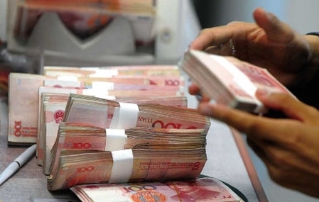 経済アナリストは「中国は2016年に債務不履行ラッシュが訪れる」と予測する（AFP）